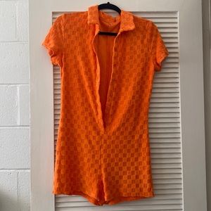 Orange checkered one piece.